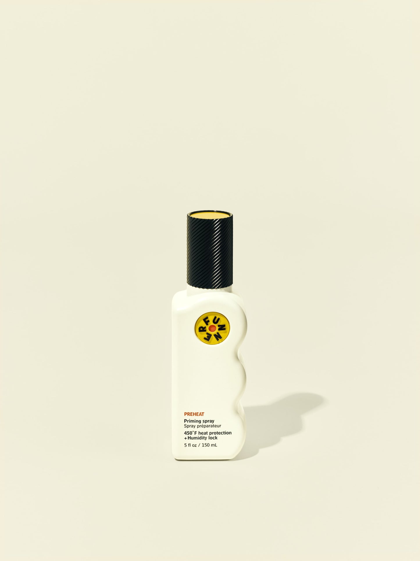 Front solo packshot of PreHeat bottle against a beige background