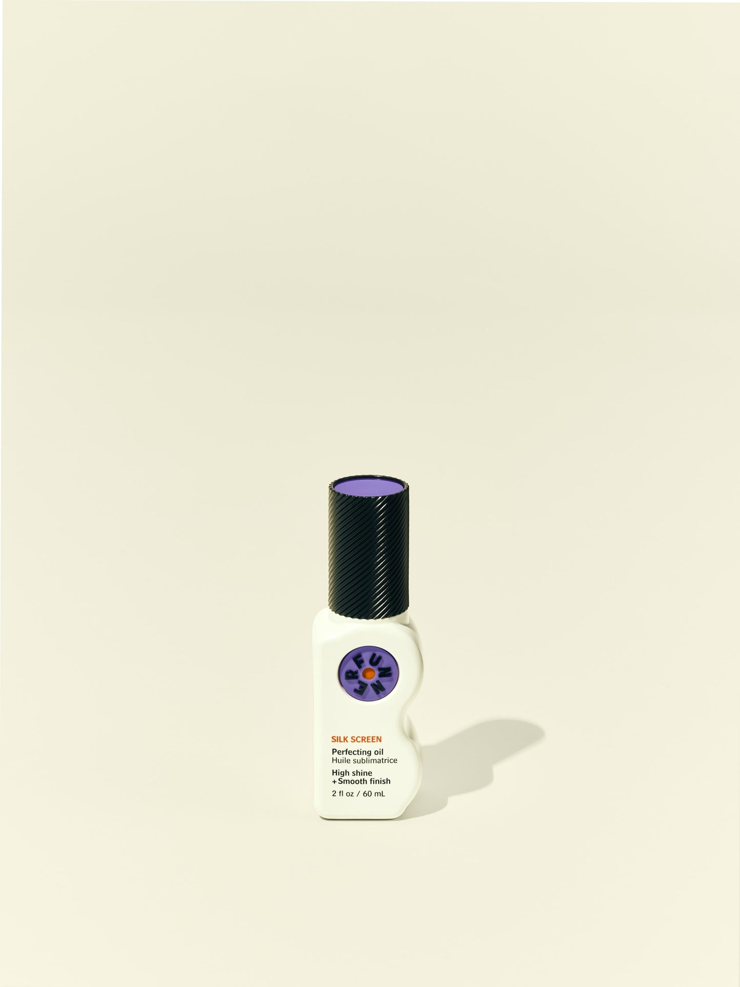 Front solo packshot of Silk Screen bottle against a beige background