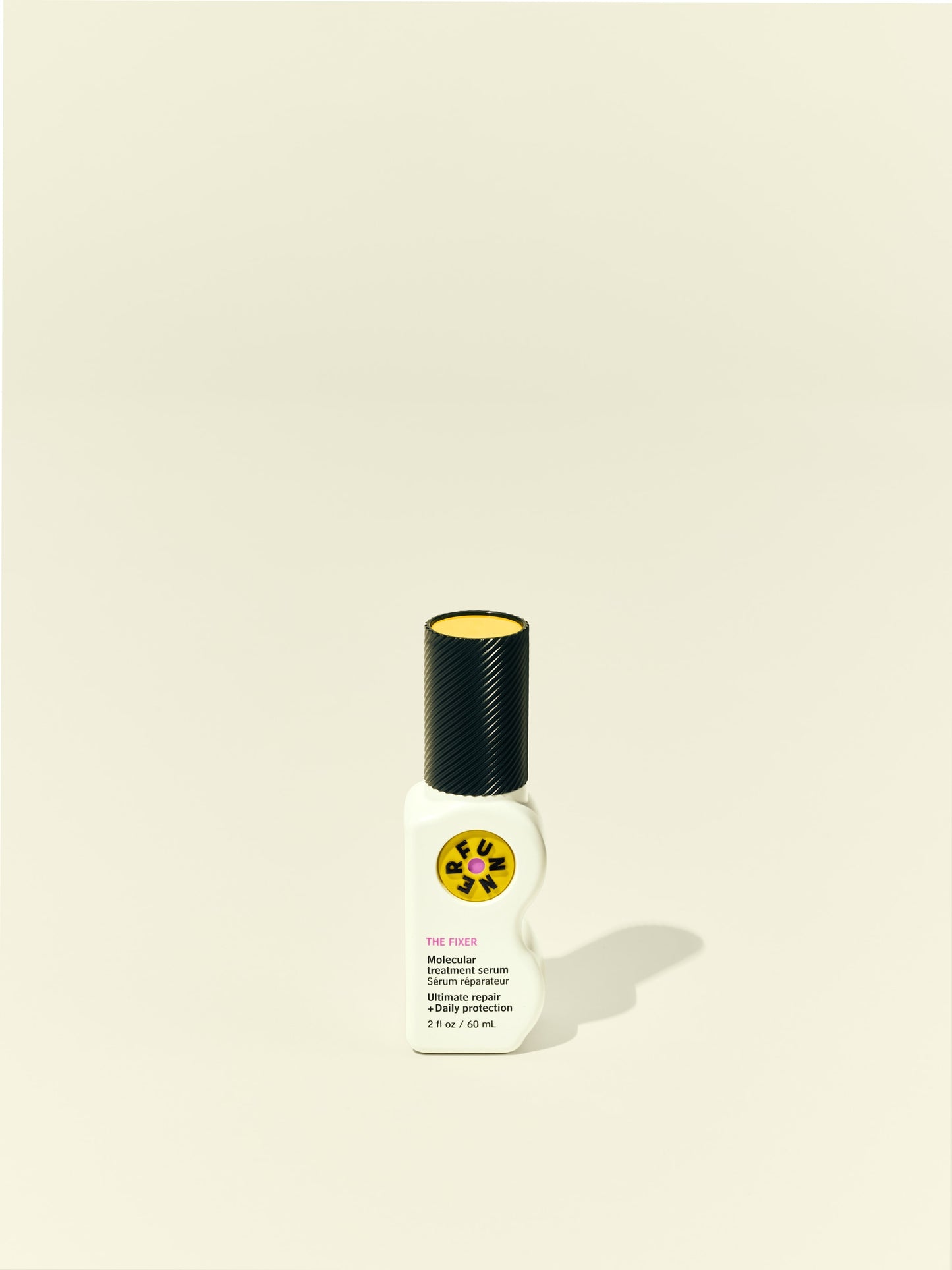 Front solo packshot of The Fixer bottle against a beige background