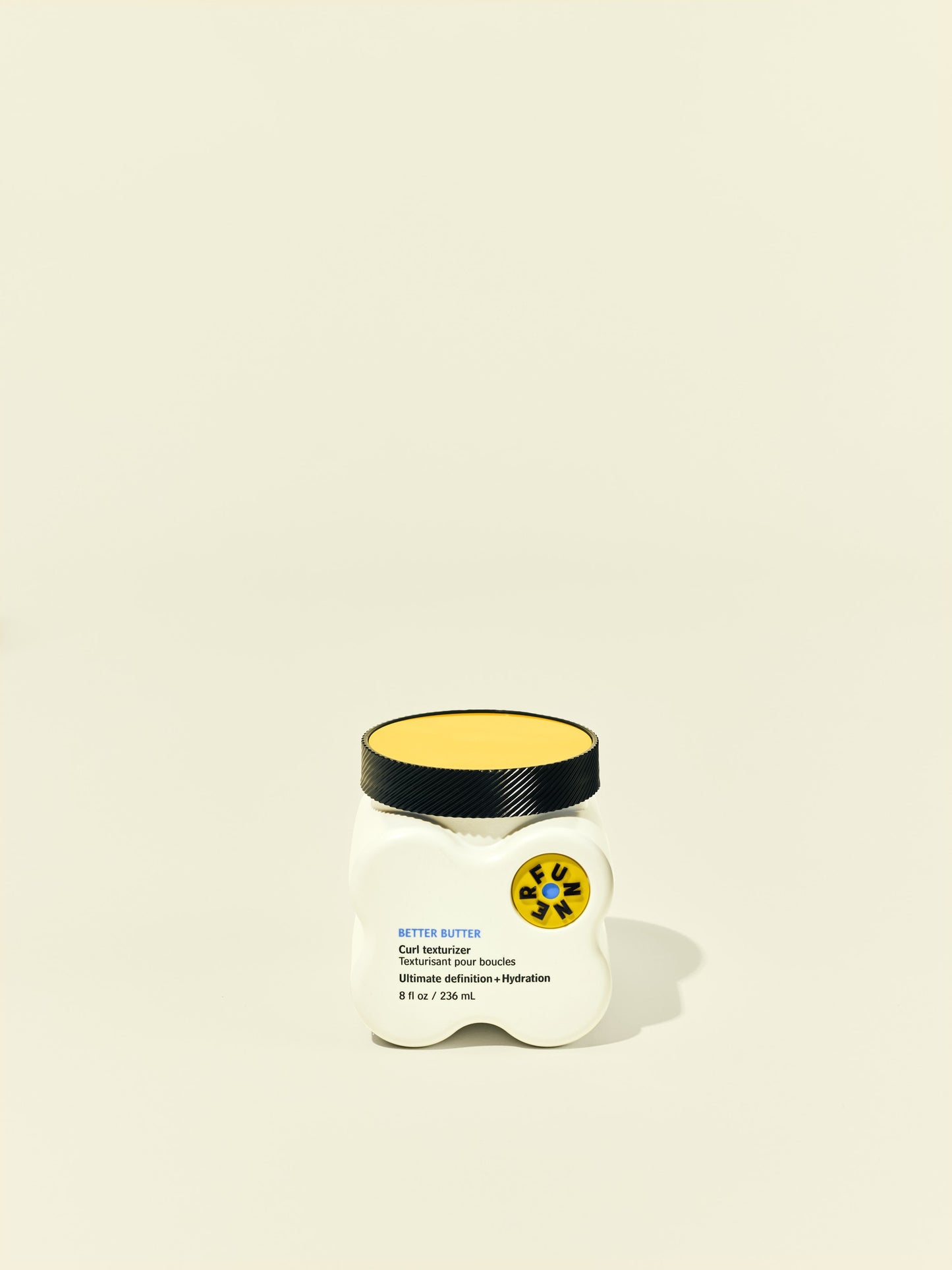 Front solo packshot of Better Butter jar against a beige background