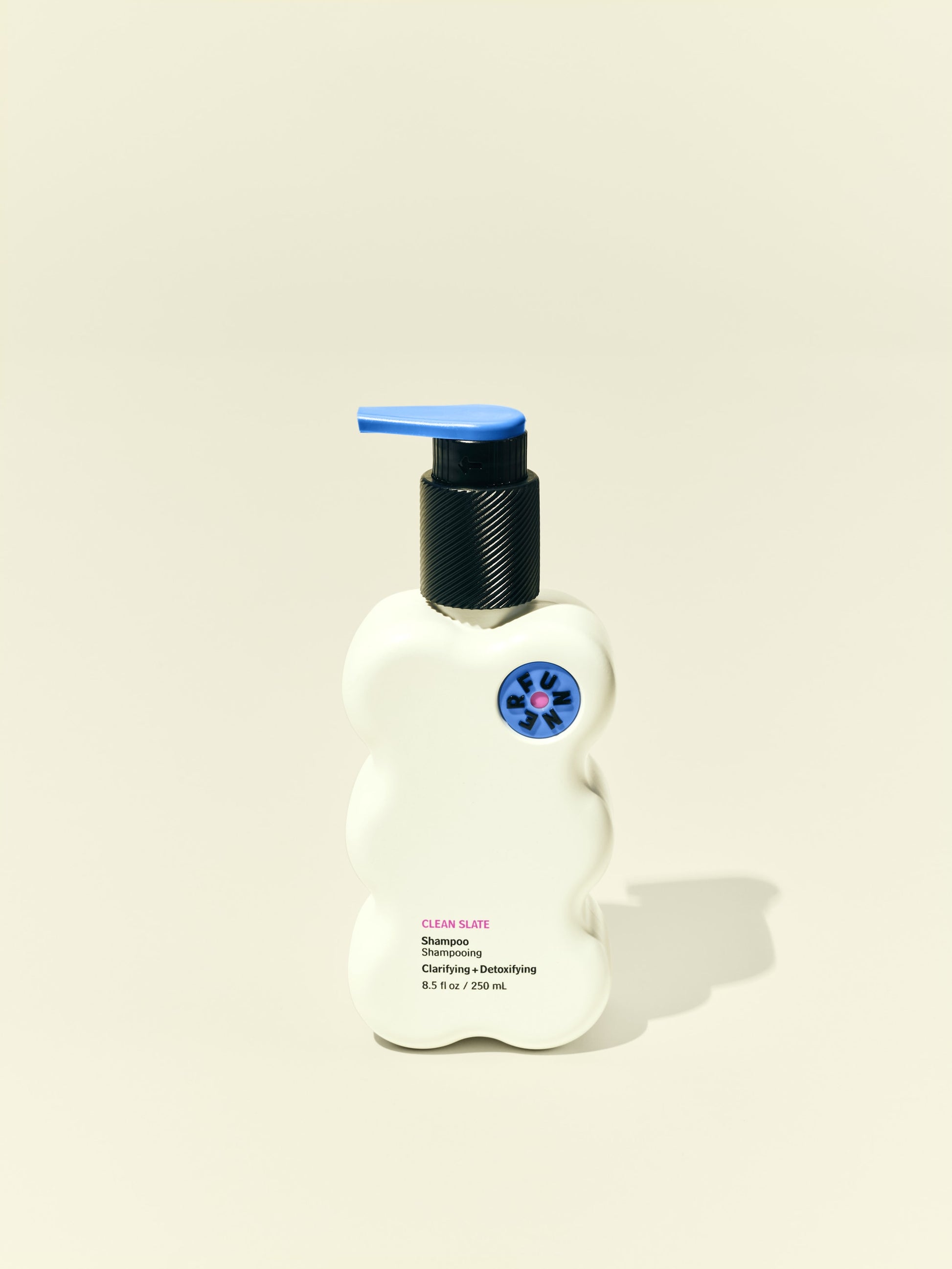 Front solo packshot of Clean Slate bottle against a beige background