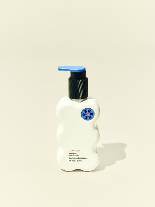 Front solo packshot of Clean Slate bottle against a beige background