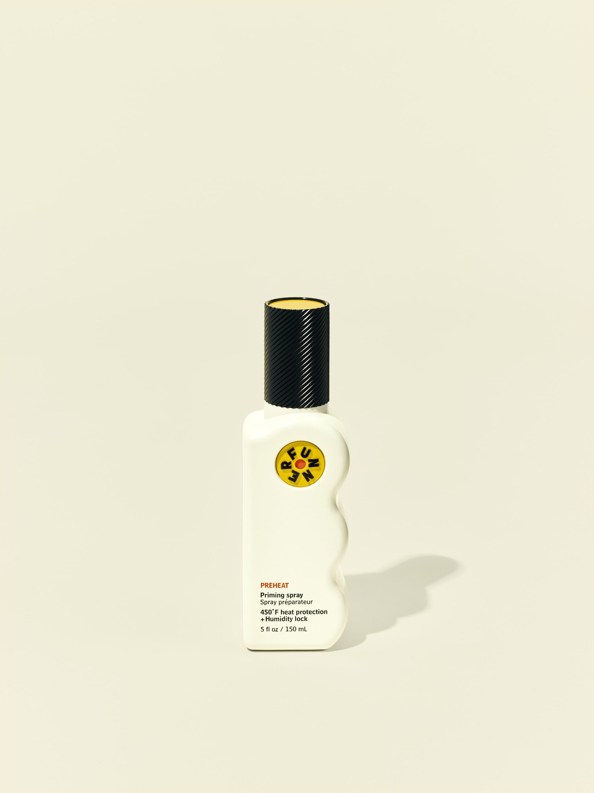 Front solo packshot of PreHeat bottle against a beige background