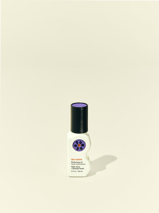 Front solo packshot of Silk Screen bottle against a beige background