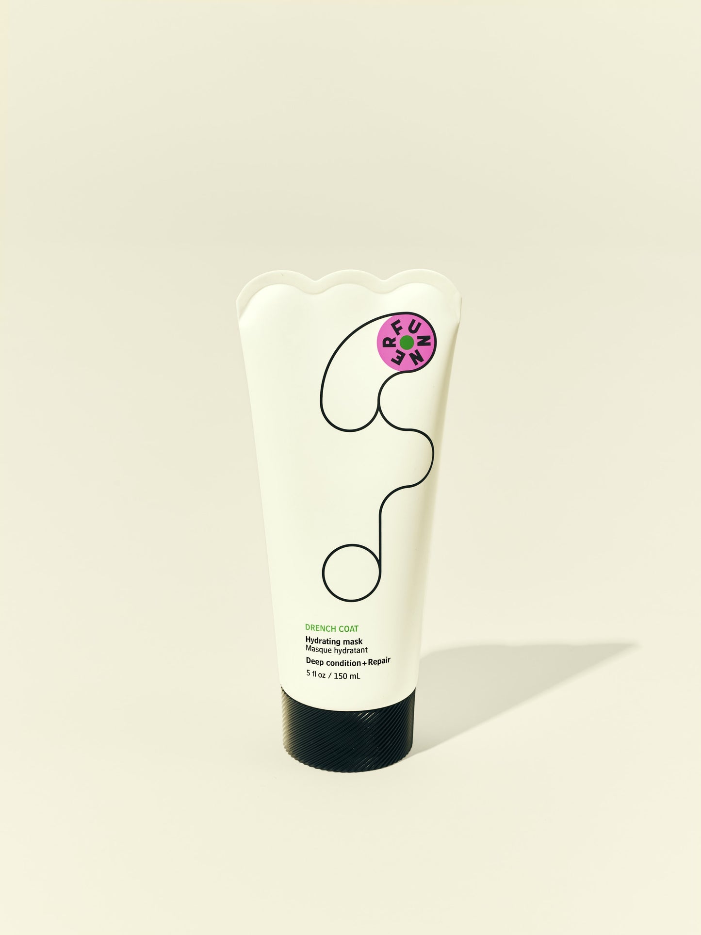 Front solo packshot of Drench Coat tube against a beige background